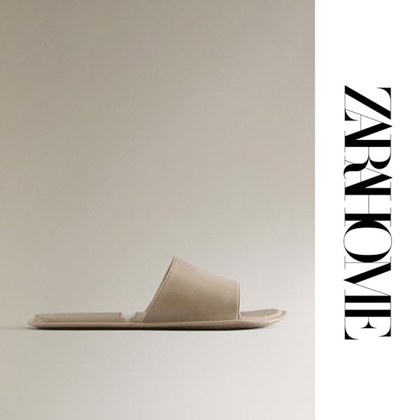 This ad showcases a pair of Zara Home slippers on a neutral background with the brand logo.