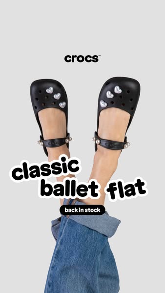 This image ad showcases Crocs' Classic Ballet Flat in black with heart-shaped Jibbitz. The ad features a person wear