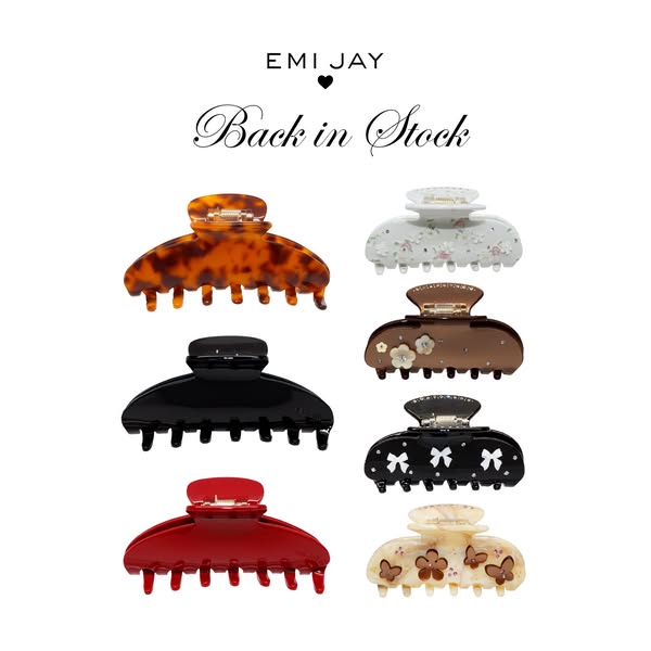 This ad by Emi Jay features an assortment of claw clips against a white background, emphasizing that the product is back