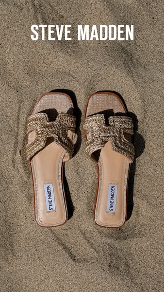 This ad showcases Steve Madden sandals on a sandy surface, emphasizing a beach or summer aesthetic. The brand name is pr