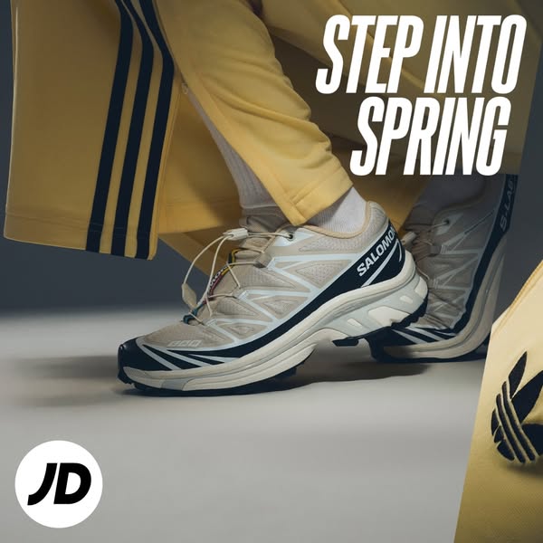 This image ad by JD Sports promotes Salomon sneakers, encouraging viewers to 'Step into Spring' with a focus on 