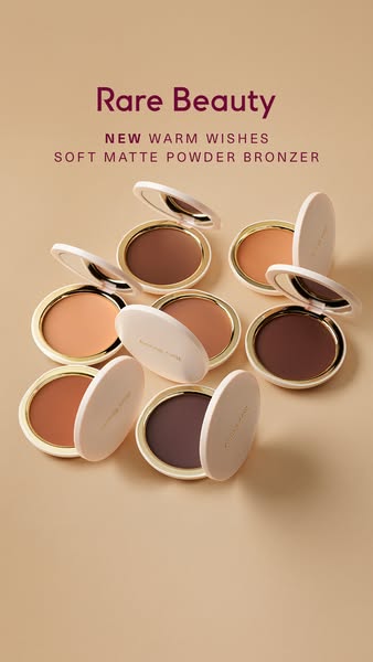 This ad showcases the Rare Beauty Warm Wishes Soft Matte Powder Bronzer in a variety of shades, highlighting the range o