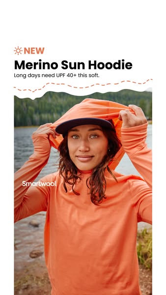 This ad showcases a woman wearing a Merino Sun Hoodie while hiking in nature. The ad aims to highlight the product's