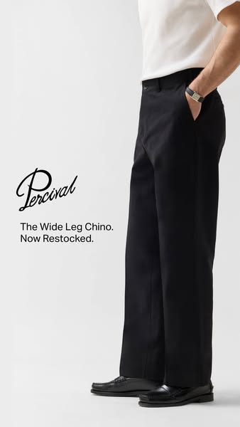 This image ad features a photo of a person from the waist down, wearing black Percival wide leg chinos and black shoes. 