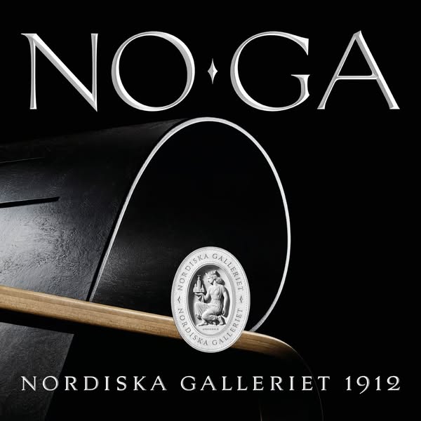 A sophisticated and minimal image ad for Nordiska Galleriet 1912, featuring a close-up of a sleek black chair with the b