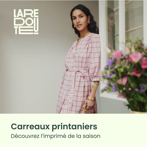 This ad showcases a woman in a pink plaid dress to highlight the pattern design that's new for the spring season.