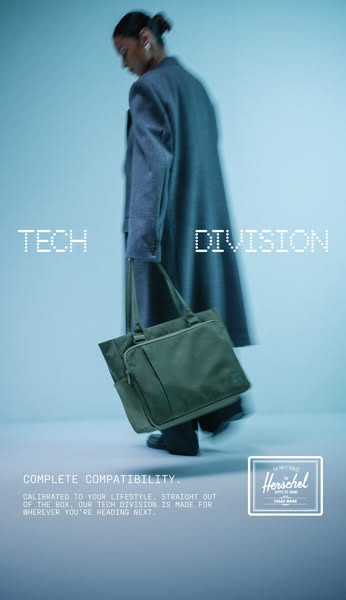 This image ad for Herschel's Tech Division features a model walking while carrying a Tech Division tote bag. The ad 