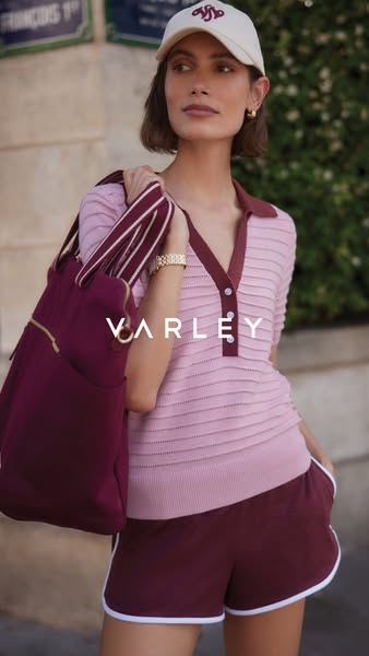 This image ad showcases a woman wearing Varley apparel and accessories, photographed outdoors.