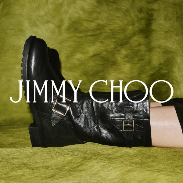 This ad features a pair of black Jimmy Choo boots against a green background. The brand name is prominently displayed.