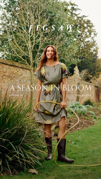 An image ad for Jigsaw clothing presents the brand's Spring 26 collection. A female model stands in an outdoor setti