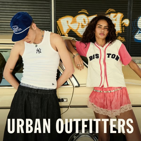 This image ad for Urban Outfitters showcases a gender-neutral style with a focus on baseball-themed apparel. It features