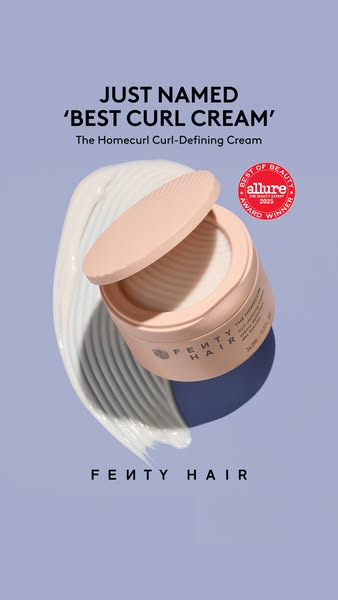 This ad showcases Fenty Hair's Homecurl Curl-Defining Cream, highlighting its award-winning status and visually demo