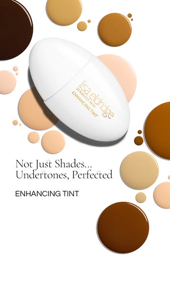 This image ad showcases Lisa Eldridge's Seamless Skin Enhancing Tint, emphasizing its ability to perfect undertones 