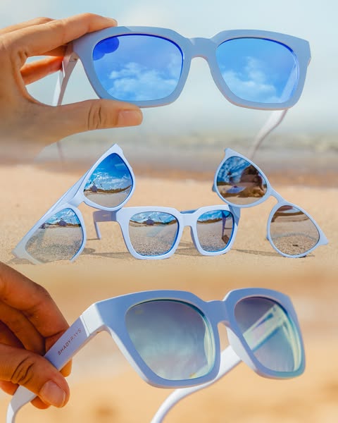 This is a product ad for Shady Rays sunglasses, highlighting the light-blue color of the frames and lenses against a bea