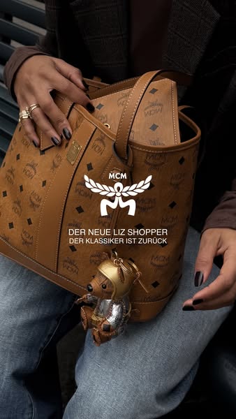 This image ad promotes the new MCM Liz Shopper bag, highlighting its return as a classic item.