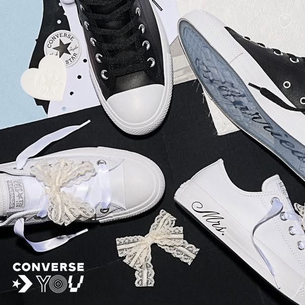 An image showcasing a pair of Converse sneakers customized for a wedding. One pair is black leather with white soles, an
