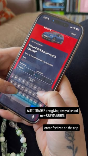 This social media image ad promotes an AUTOTRADER giveaway of a CUPRA Born vehicle. The ad shows a phone screen with the