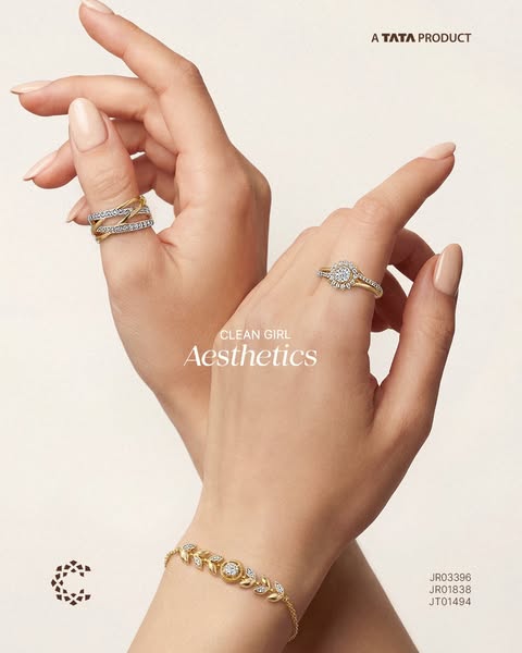 This image ad features a close-up of a hand adorned with gold and diamond jewelry. The ad highlights the 'Clean Girl