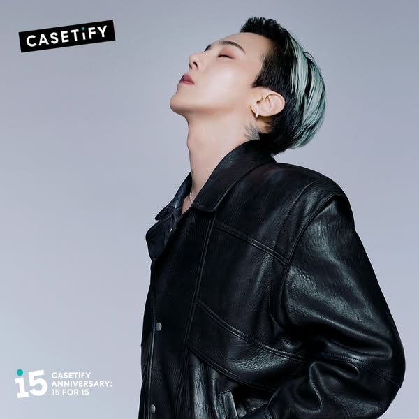 This ad features a stylized portrait of an Asian man wearing a black leather jacket against a soft grey background. The 