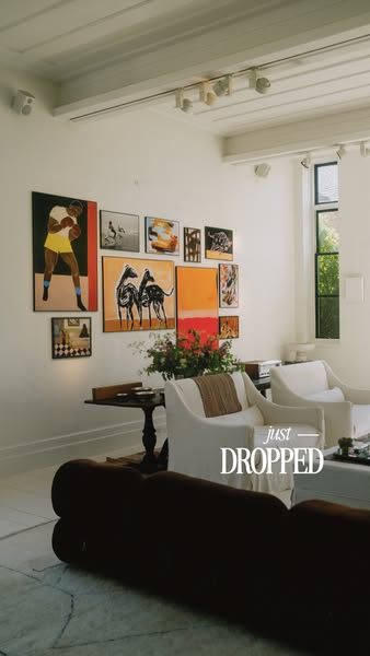 This image ad features a neutral-colored living room setting with the text overlay "just - DROPPED" to announc