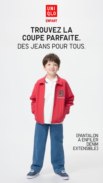 This ad by Uniqlo features a young child modeling denim pants.