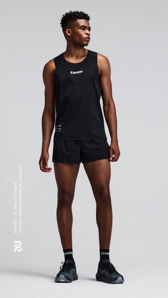 This ad showcases Bandit brand running apparel. A male model is shown wearing a tank top, shorts, socks, and shoes from 