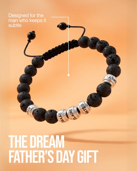 An image ad for a personalized bracelet. The bracelet is made of black stone beads and has silver beads that can be engr