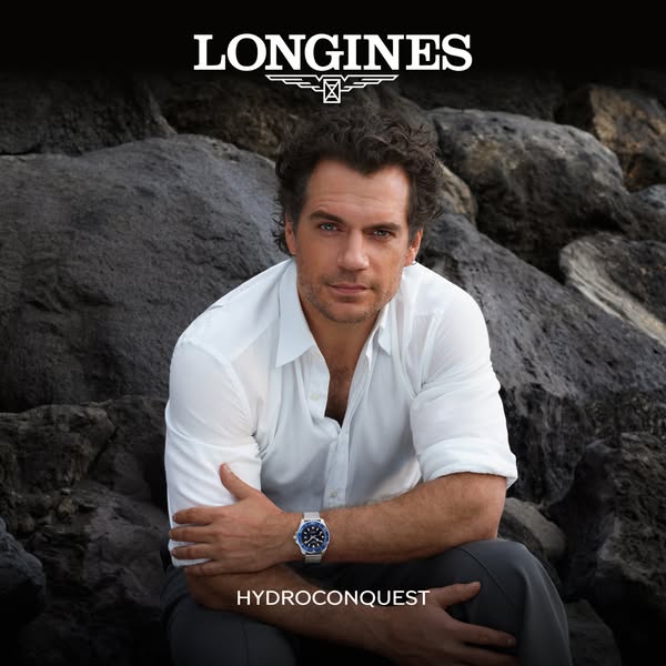 This ad features a celebrity endorsement, showcasing the Longines Hydroconquest watch in a lifestyle setting.