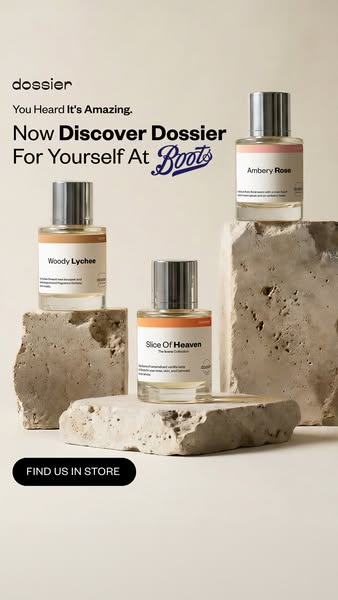 An ad for Dossier perfume featuring three of their fragrances stacked on stone blocks. The ad encourages viewers to disc