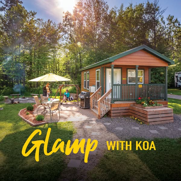This ad shows a KOA campground cabin and invites the viewer to try "glamping" with KOA.