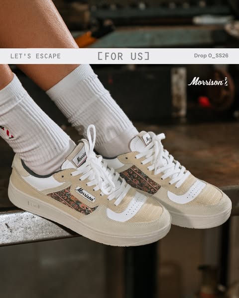 This ad showcases a pair of cream and white sneakers in a lifestyle setting. The ad uses a tagline to emphasize a sense 