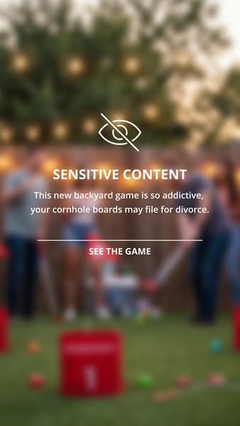 The image is blurred out to draw attention. The user is being told the game is highly addictive and they should click to