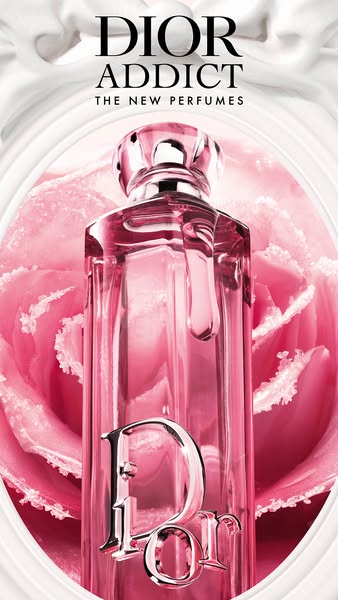 This ad showcases the Dior Addict perfume bottle against a backdrop of a pink rose and white fabric.