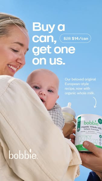 This ad for Bobbie organic infant formula features a mother holding her baby, with a can of Bobbie formula in the foregr