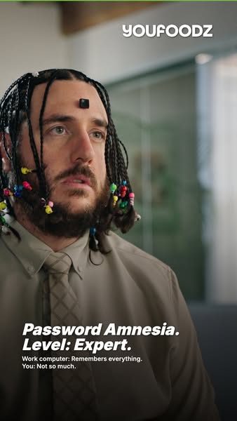 This ad is for Youfoodz. It shows a man wearing a black square device on his forehead, and his hair is braided with colo