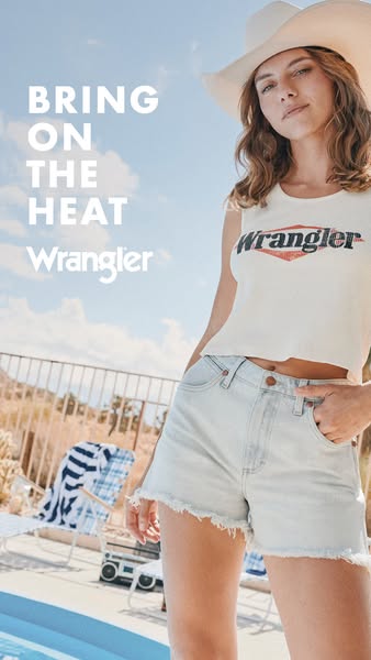 This ad features a woman wearing a Wrangler t-shirt and light wash denim shorts in front of a pool. The ad's headlin