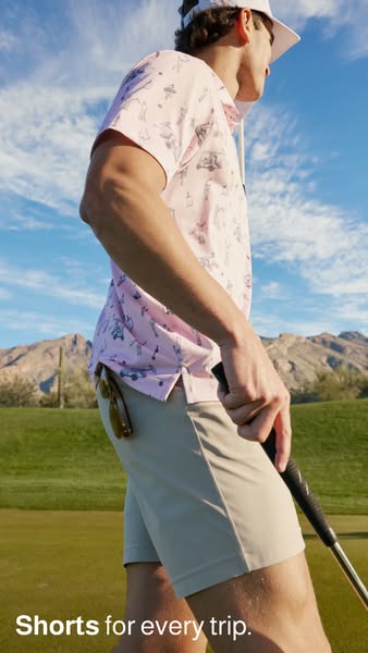 This ad promotes golf shorts from a brand that sells apparel. The ad shows a man wearing the shorts and a pink golf shir