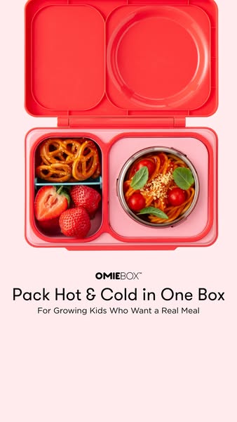 This ad features an image of an OmieBox lunchbox with an open lid, filled with snacks and a hot meal. The headline empha