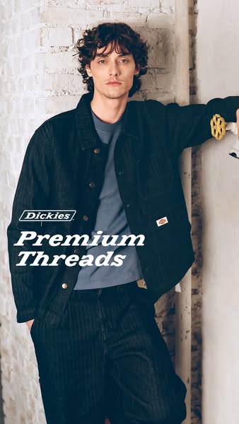 A man wearing Dickies is shown in a casual pose.