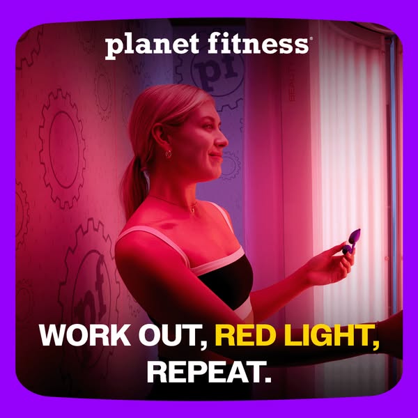 A Planet Fitness ad featuring a woman inside of a red light therapy booth. It promotes the gym as a place to workout, us