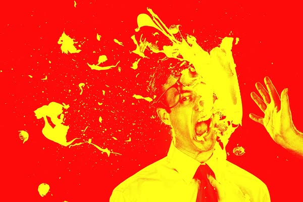 This ad uses shock and humor to grab attention. It features a man getting hit in the face with a pie, presented in a hig