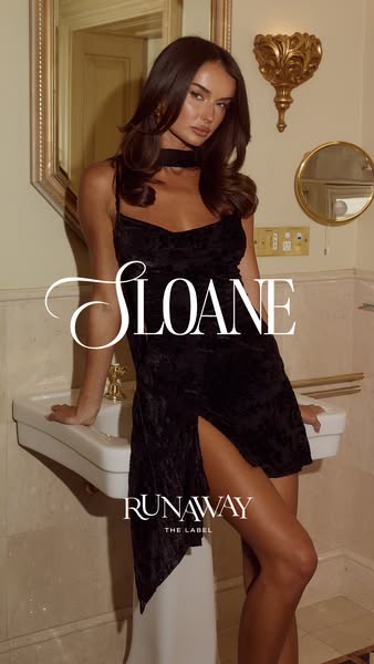 This ad features a model in a bathroom leaning against a sink while wearing a black dress from Runaway The Label. The fo