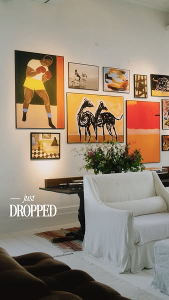 This ad is designed to promote a recently dropped collection of art pieces, showing a room in a home decorated with a se