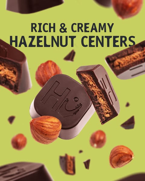 An image ad promoting Hu chocolate hazelnut butter-filled squares, highlighting their rich and creamy hazelnut centers.