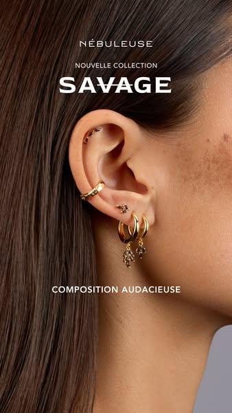 An image ad for Nébuleuse jewelry features a close-up of a person's ear adorned with the brand's earrings and ea
