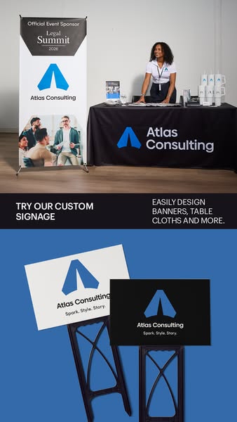 This image ad for Atlas Consulting features their custom signage. The top of the ad shows their banner, table cloth, and