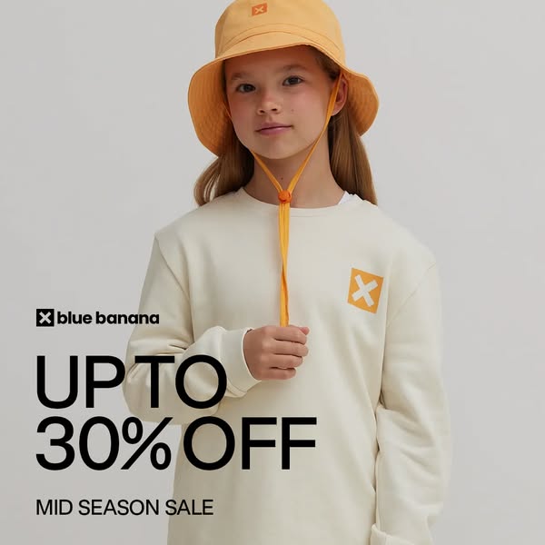 An ad for Blue Banana clothing featuring a young model wearing their products, highlighting a mid-season sale of up to 3