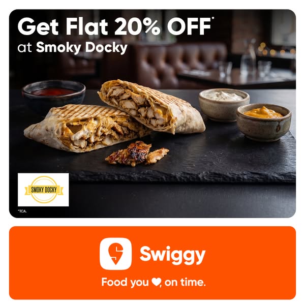 An image ad from Smoky Docky offering 20% off food that is ordered through Swiggy.