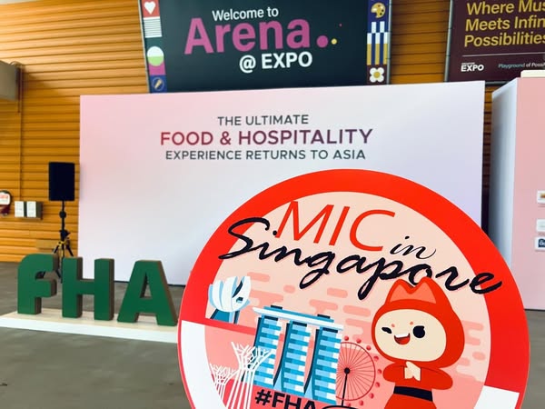 This ad is for the Food & Hospitality Asia trade show in Singapore. The image shows a branded backdrop with the even
