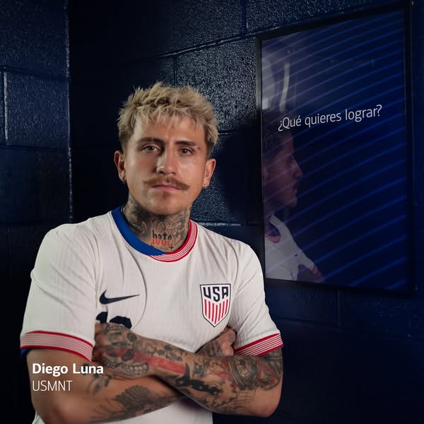 This ad features Diego Luna wearing a USA soccer jersey standing next to an advertisement with the question, "¿Qué 